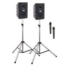Two speakers on stands with microphones